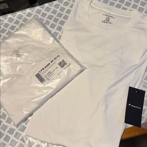 NEW…Fabletics 24 seven short sleeve tee classic Set of (2) white…